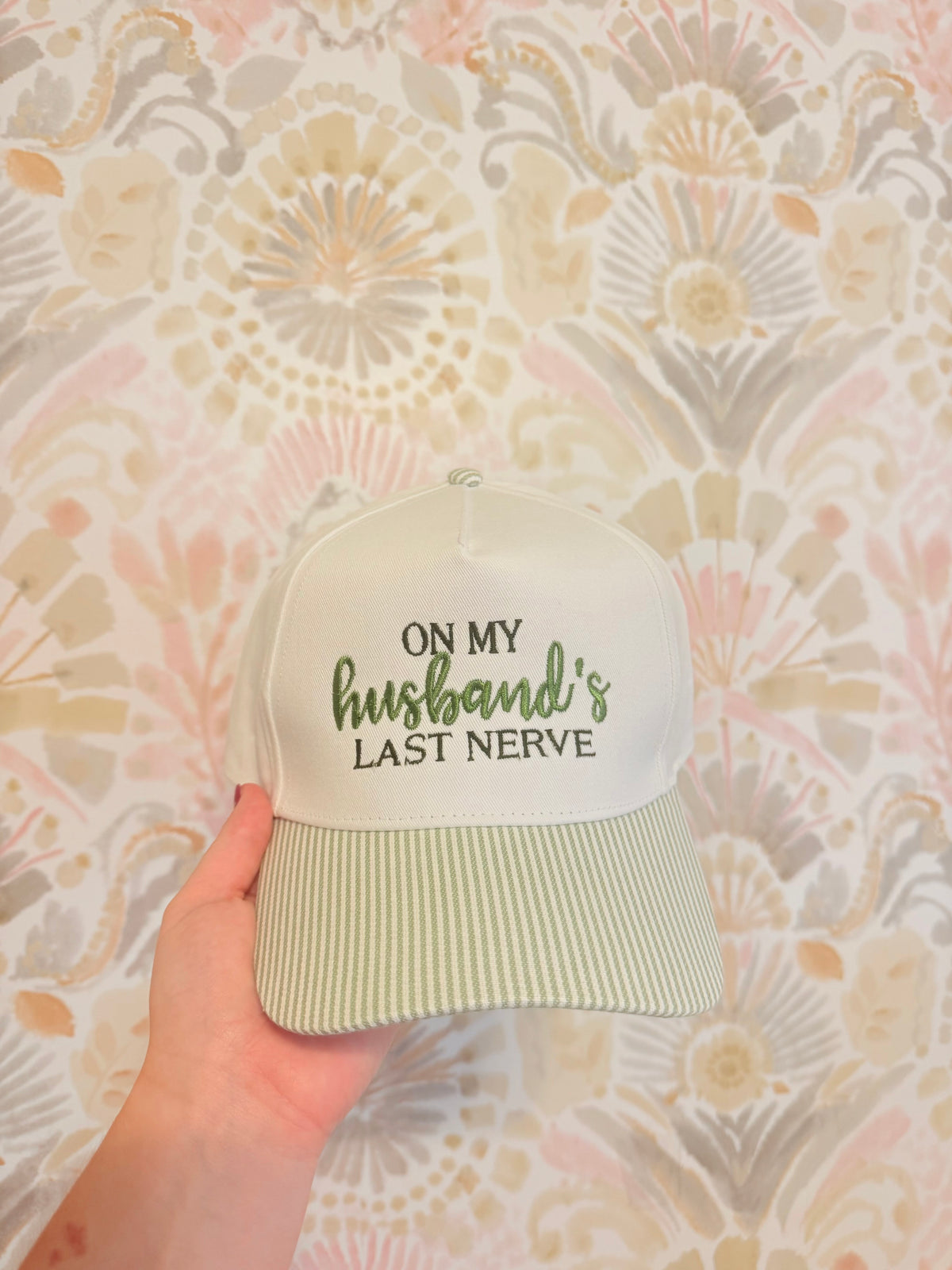 On my husband last never Blue striped hat